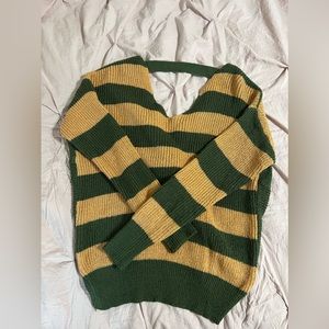 Green and orange shirt- fits like a medium, has open back